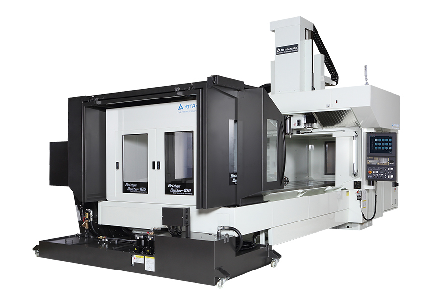 Kitamura Bridgecenter-10G double column machining center with large work area, dual sliding doors, and an advanced CNC control panel.
