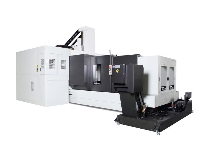 Kitamura Bridgecenter 12G CNC machine with an enclosed workspace and auxiliary systems.