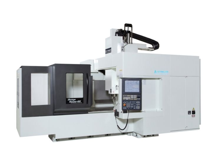 Kitamura Bridgecenter 8G CNC machine with an enclosed workspace and control panel.