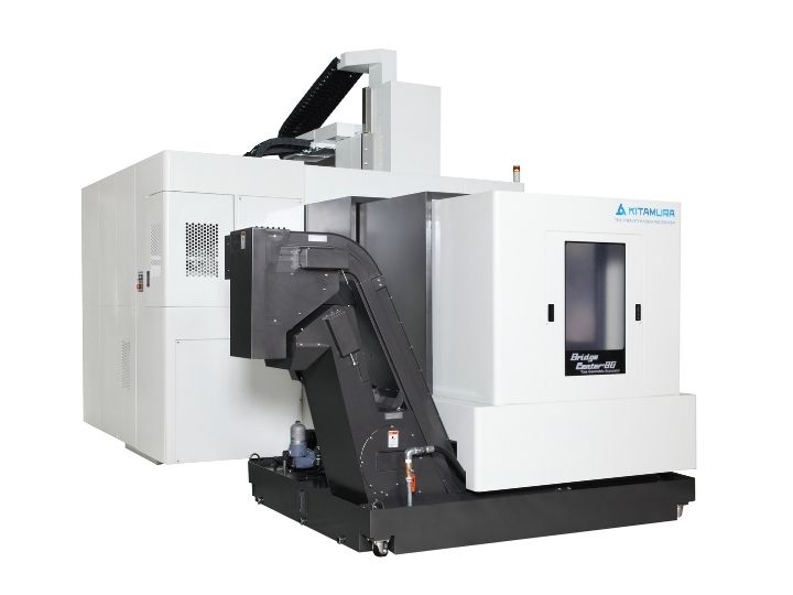 Kitamura Bridgecenter 8G CNC machine with an enclosed workspace and chip conveyor system.