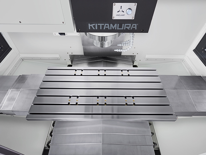 Kitamura Mycenter 5XV CNC machine with a large enclosed workspace and control panel.